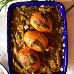 A picture of Peyajkoli Dim (Egg cooked with Spring Onion).