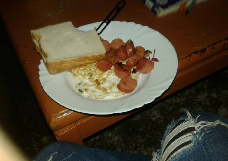 Fried egg with fried sausages