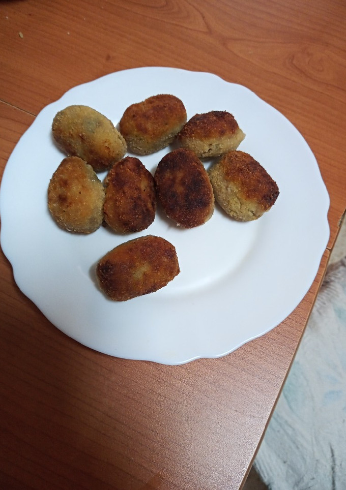 Una foto de Croquetas de bacon y dátiles