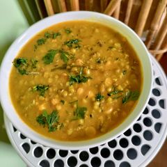 A picture of Whole Green Moong And Chana Daal Curry.