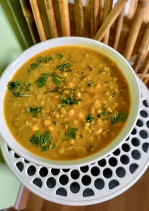 A picture of Whole Green Moong And Chana Daal Curry.