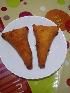 Una foto de Triángulos pizzeros de pan de molde