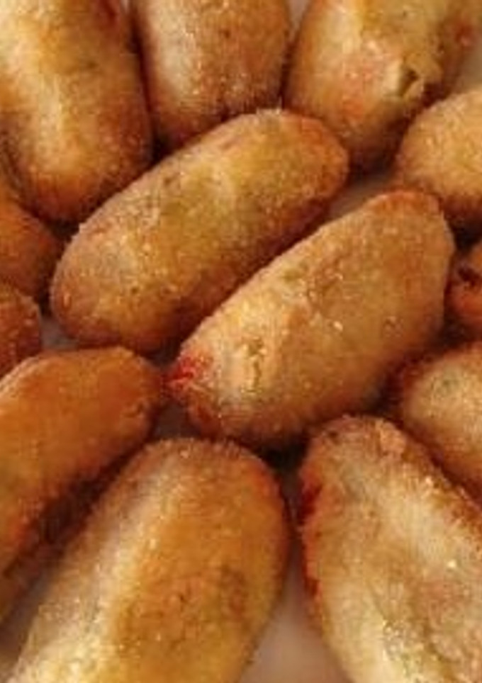 Una foto de Croquetas de pescado y cebolla