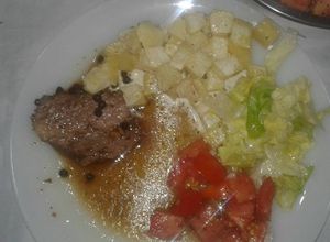 Una foto de Pecho a la pimienta con papas a la crema