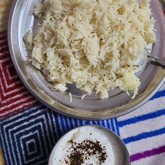 A picture of Jeera rice with jeera curd.