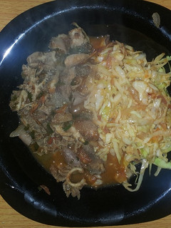 A picture of Matumbo with fried cabbage.