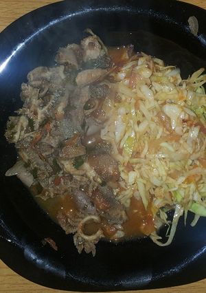 A picture of Matumbo with fried cabbage.