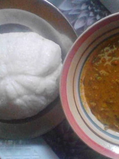 A picture of Tuwon rice with groundnut soup.