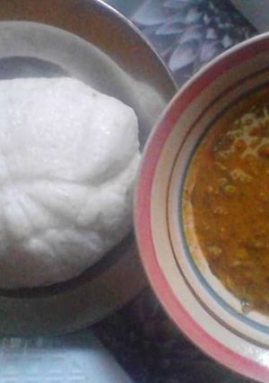A picture of Tuwon rice with groundnut soup.