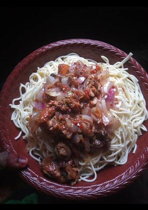 A picture of White spaghetti with stew.