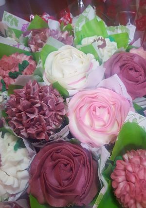 A picture of Strawberry frosted cupcakes.