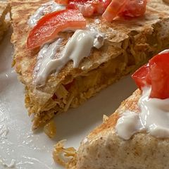 A picture of Cast iron chicken quesadillas.