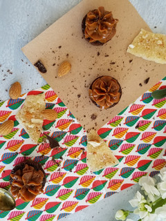 Una foto de Muffins de banana, chocolate y dulce de leche