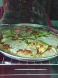 Pizza mixta con masa casera