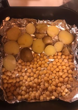A picture of Air-fry potatoes and chicken pea.