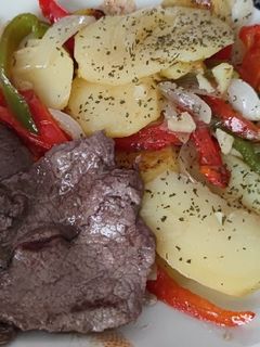 Una foto de Papas a lo pobre