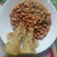A picture of Chapati with Coconut Beans.