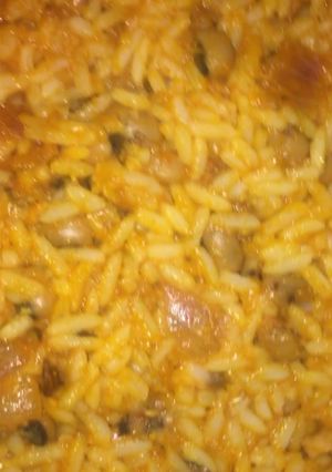 A picture of Jollof rice and beans.