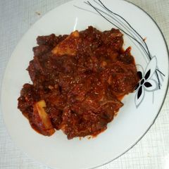 A picture of Spicy, Sweet and sour beef with pineapples.