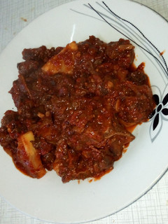 A picture of Spicy, Sweet and sour beef with pineapples.