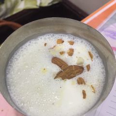 A picture of Banana coconut Badam shake.