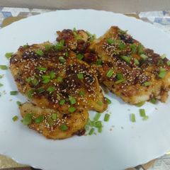 A picture of Chicken breast with honey garlic sauce.