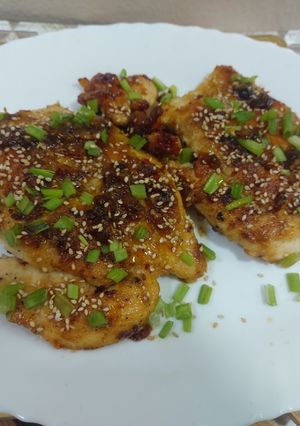 A picture of Chicken breast with honey garlic sauce.