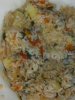 A picture of Fried rice with spinach.