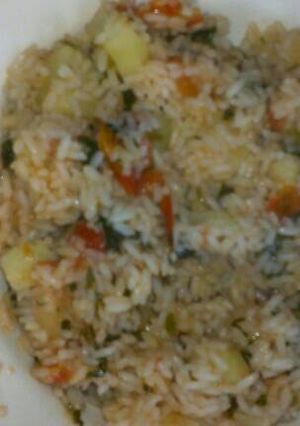 A picture of Fried rice with spinach.
