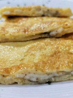 Una foto de Tortilla de queso trufada