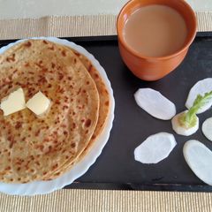 A picture of Stuffed Radish Paratha with a twist.