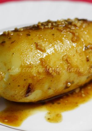 Una foto de Pota rellena de cuscus con calamares en su tinta