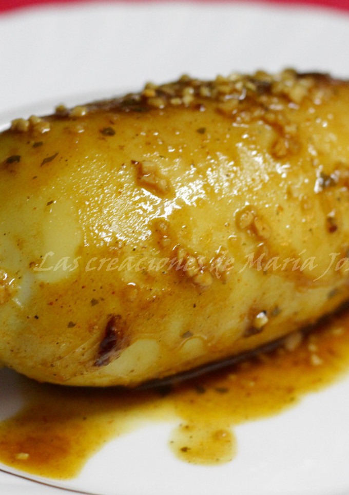 Una foto de Pota rellena de cuscus con calamares en su tinta