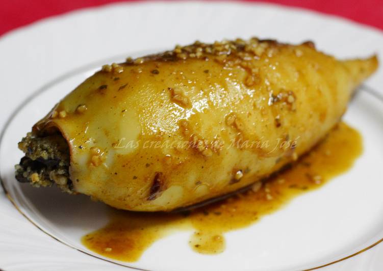 Pota rellena de cuscus con calamares en su tinta