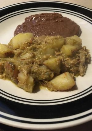 Una foto de Carnitas de cerdo con papas