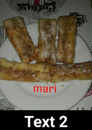 Foto principal de Rollito de pan de molde relleno de crema pastelera con toque de anís