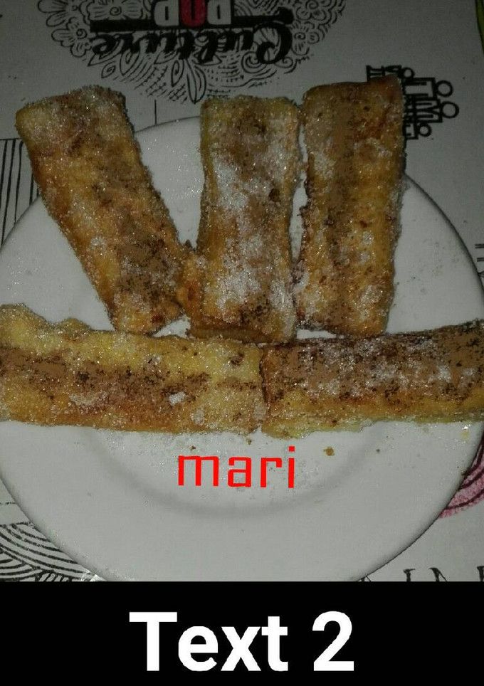 Una foto de Rollito de pan de molde relleno de crema pastelera con toque de anís