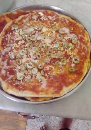 صورة لوصفة بيتزا في الطاجين