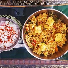A picture of #LBC Tava pulav,& raita.