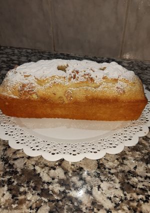 Una foto de Budín de vainilla con nueces.
