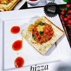 A picture of Pizza 🍕 Toast.