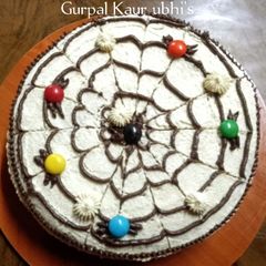 A picture of 🕷️ Spooky Spider-Web Chocolate Cake 🎃🍫.