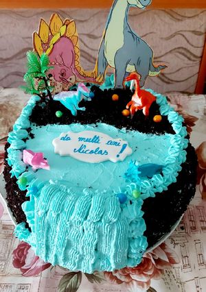 A picture of Moist chocolate cake with whipped cream frosting.
