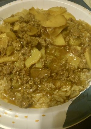 A picture of Meat and Potatoes over Rice.