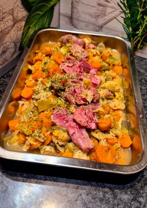 A picture of Pork Shank with Vegetables.