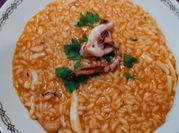 Una foto di risotto con i gamberi
