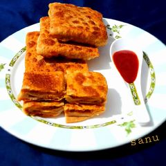 A picture of Mughlai Egg Paratha.