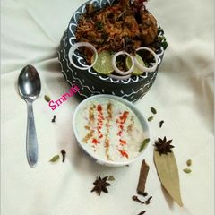 A picture of Kashmiri Chicken Biryani.
