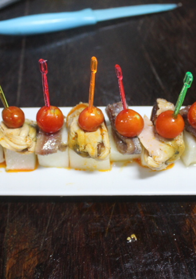 Una foto de Pinchos de mejillones y anchoas con melón