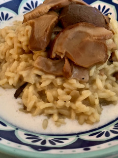 Foto di Risotto con funghi porcini su crema di caprino